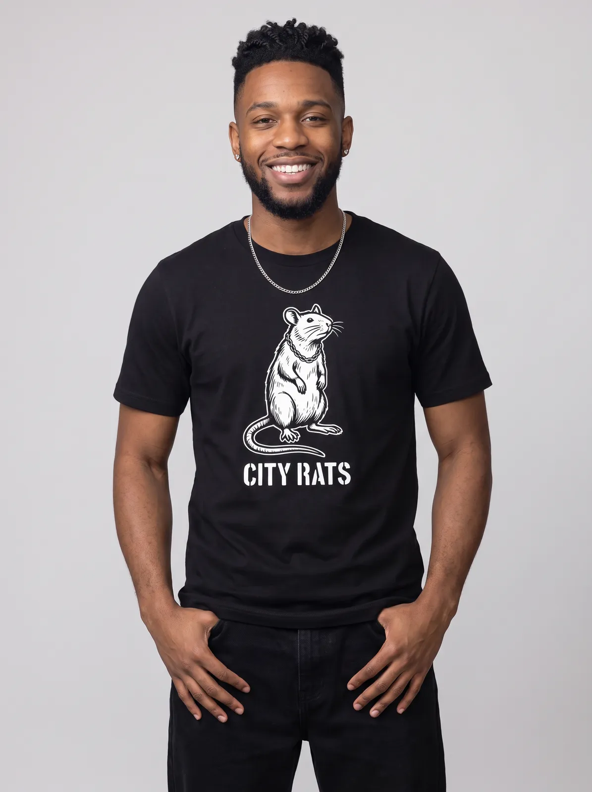 Malik Carter wearing the CITY RATS Tee in Black, waist up crop