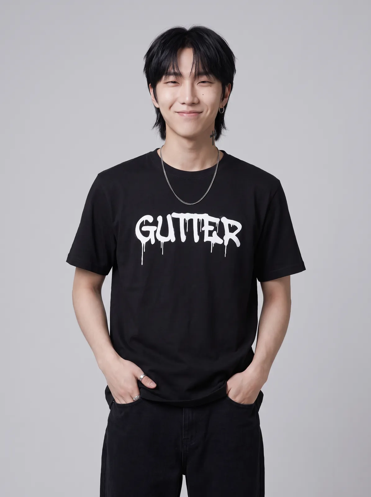 Jae Park wearing the GUTTER Tee in Black, waist up crop