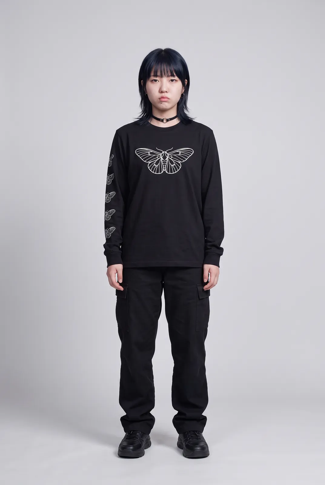 Sora Tanaka wearing the MOTH Longsleeve in Black, front hero