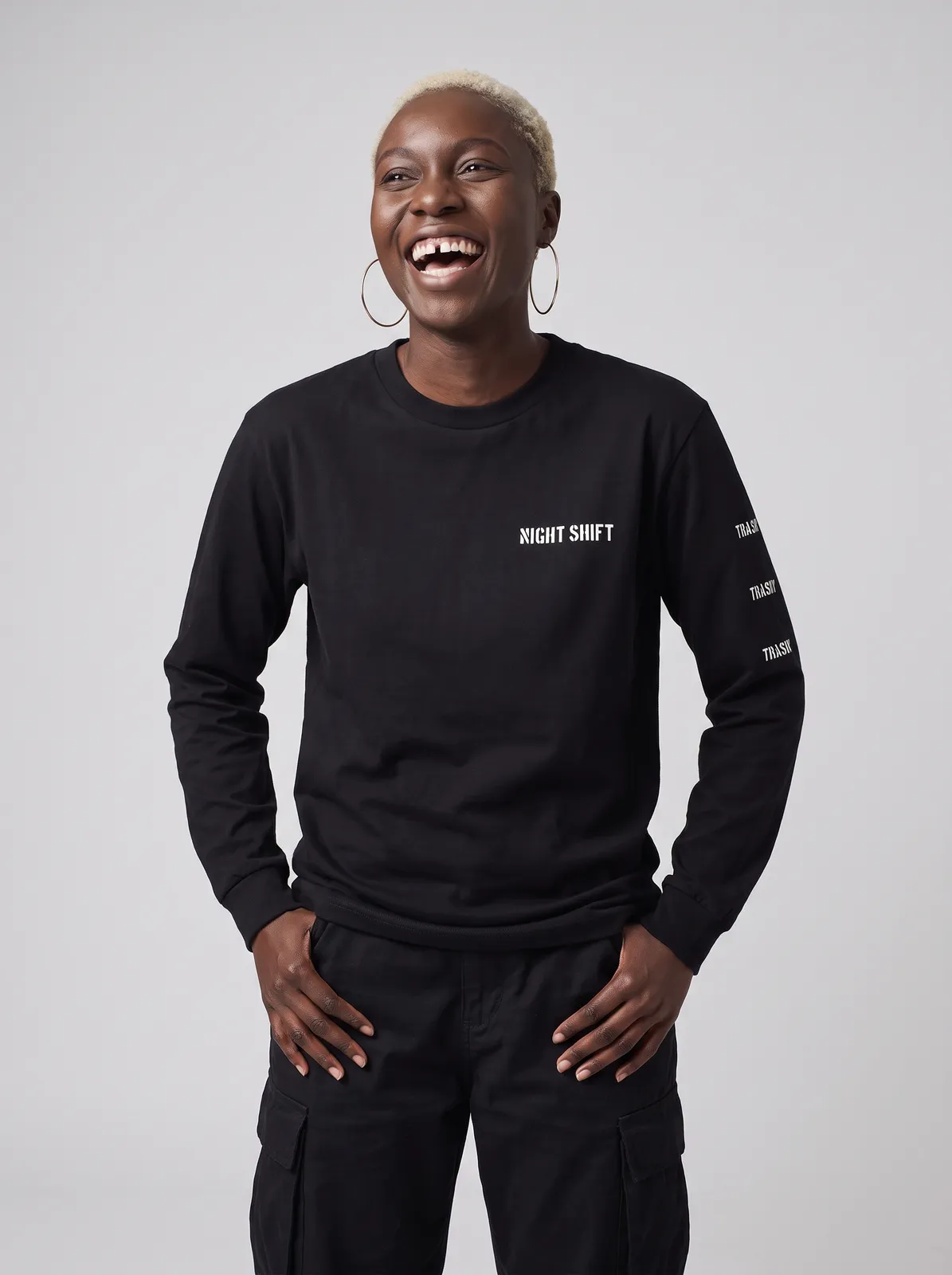 Imani Okafor wearing the NIGHT SHIFT Longsleeve in Black, waist up crop