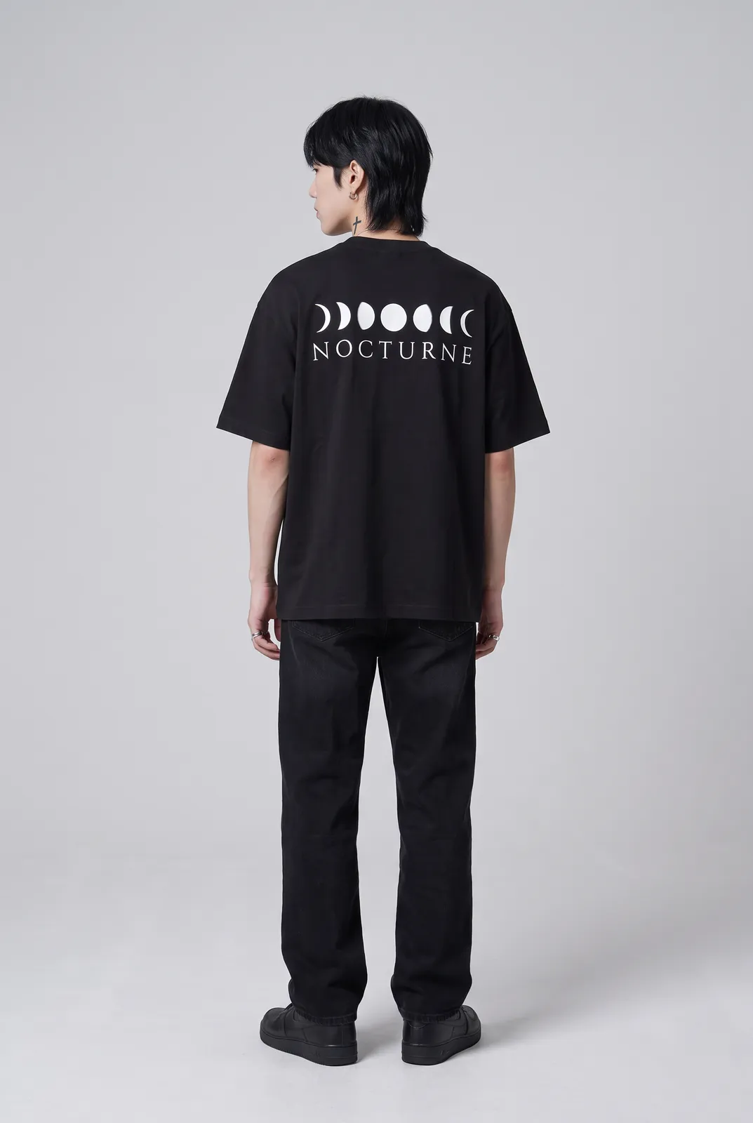 Jae Park wearing the NOCTURNE Oversized in Black, back turn