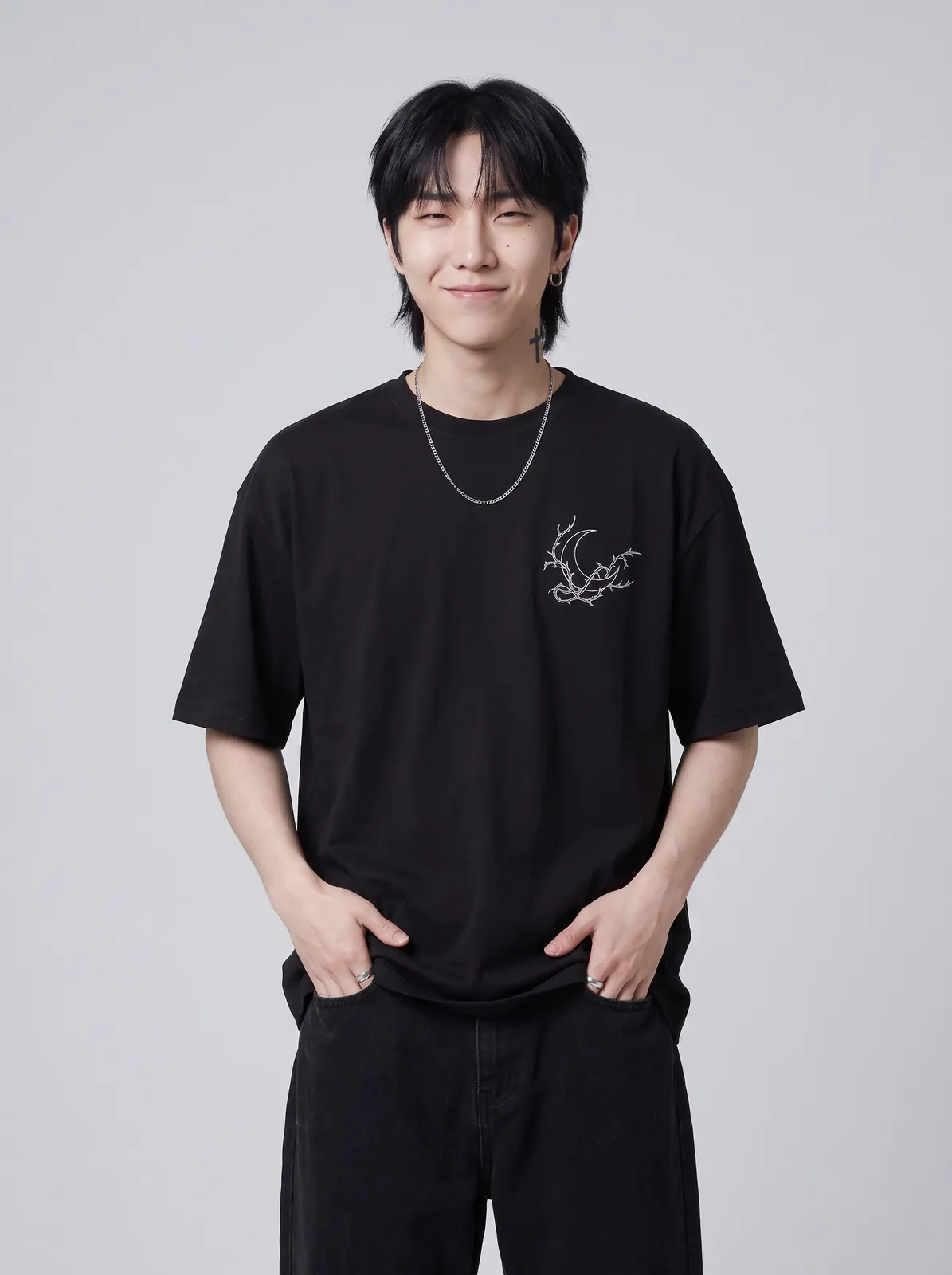 Jae Park wearing the NOCTURNE Oversized in Black, waist up crop