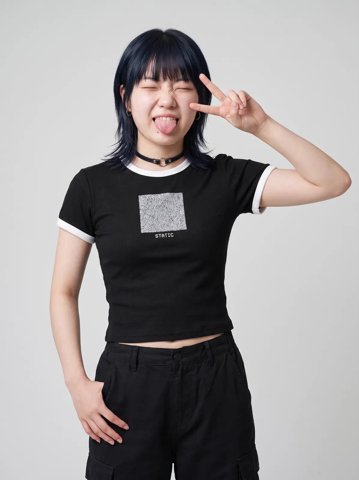 Sora Tanaka wearing the STATIC Baby Tee in Black, waist up crop